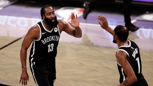 James Harden and Kevin Durant celebrate