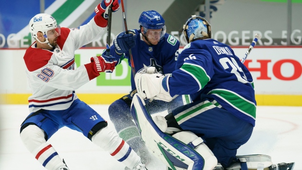 Tomas Tatar, Tyler Myers and Thatcher Demko