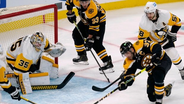 Bergeron, Bruins blank Devils to clinch playoff spot