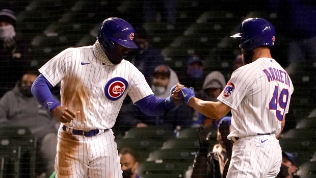 Arrieta pitches Cubs to 3-1 win over Mets on cool night