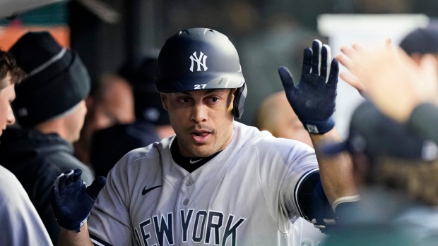 Giancarlo Stanton homers twice in debut as the Yankees' machine