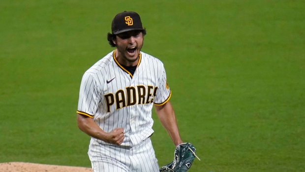 Yu Darvish fans 12, replay reversal helps Padres top Giants 3-2