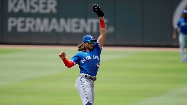 Blue Jays Injuries: Belt out of lineup with back tightness, Bichette running