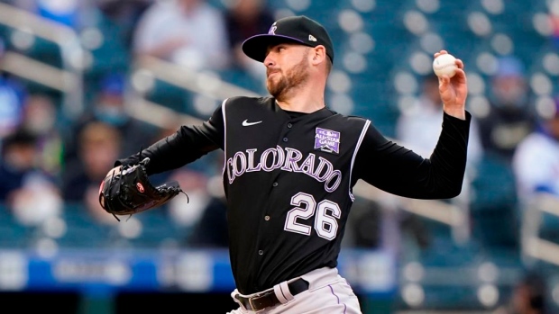 LOS ANGELES, CA - APRIL 03: Colorado Rockies second baseman Ryan McMahon  (24) takes a lead off second base during a regular season game between the  Colorado Rockies and Los Angeles Dodgers