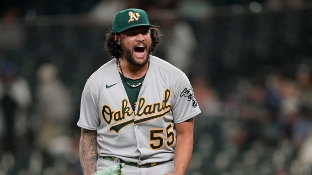 Manaea throws CG, Moreland homers as A's blank Mariners 6-0