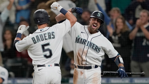 Haniger lifts Mariners over Guardians 3-2 in 11 innings