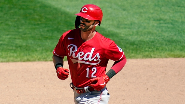 Naquin's 3-run homer in 9th gives Reds 10-7 win over Twins