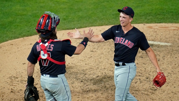 Cleveland Indians relief pitcher James Karinchak warms up in