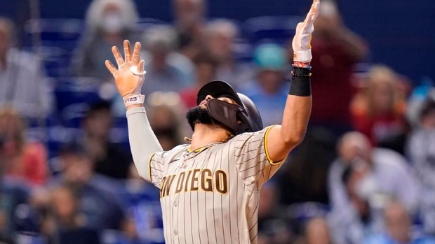 San Diego Padres' Fernando Tatis works out in center field, says