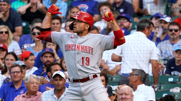 Reds power past Cubs