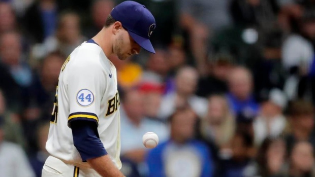 2 more Brewers positive for virus; Strickland, Cousins out