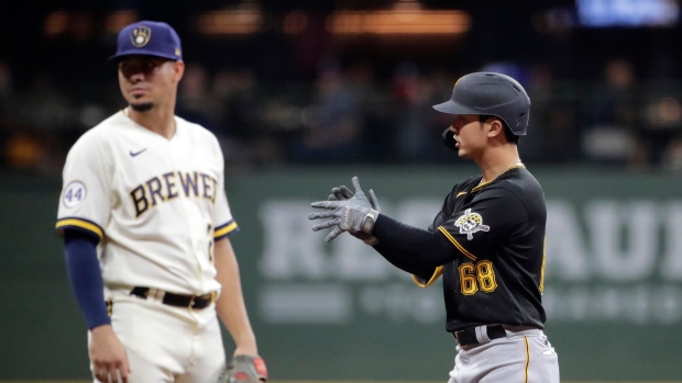Brewers catch Pirates in 9th, beat them in 10th