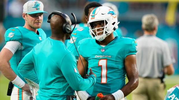 Dolphins WR Jaylen Waddle goes into the medical tent vs. Bills