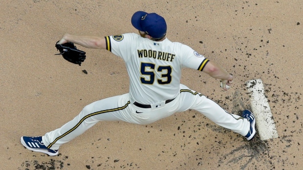 Brandon Woodruff leads Brewers past Cardinals