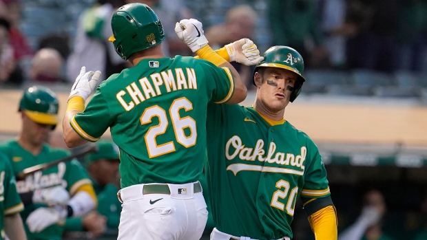 Matt Chapman of the Oakland Athletics sits in the dugout after