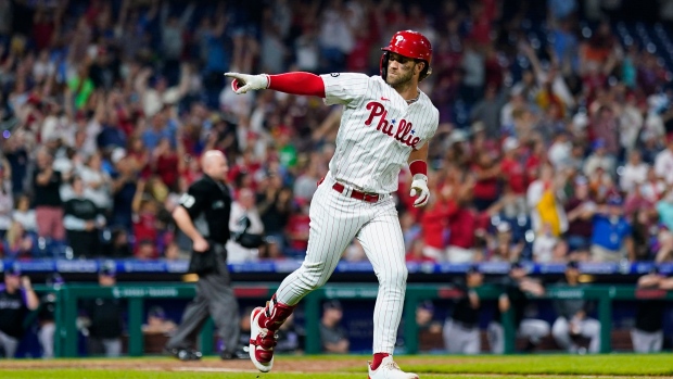 Harper's throw to plate saves Phillies' 4-3 win over O's