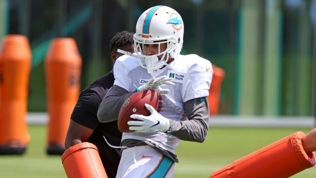 Now off COVID-19 list, Waddle back at practice for Dolphins