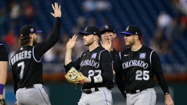 C.J. Cron homers, triples, Rockies beat Rangers in extras