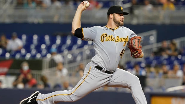 Pirates end losing skid, rally to edge Marlins 3-1
