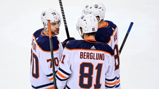 Oilers debut a new sponsor on their home helmets