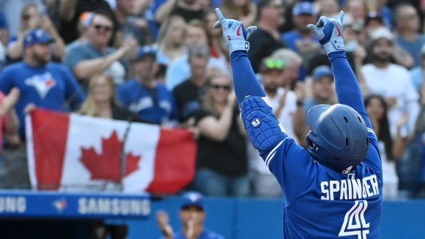 Blue Jays fend off late charge from Orioles to keep playoff hopes