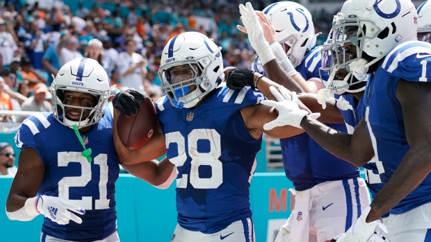 Colts get 1st win of season, top sputtering Dolphins 27-17