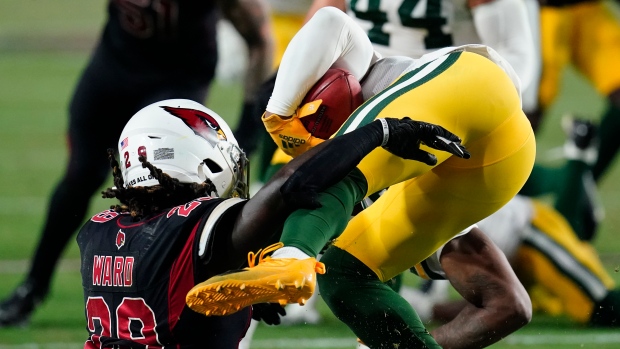 Arizona Cardinals running back Jonathan Ward (29) makes a catch in front of  Cardinals safety Deionte Thompson (22) during NFL football training camp  practice, Monday, Aug. 2, 2021, in Glendale, Ariz. (AP