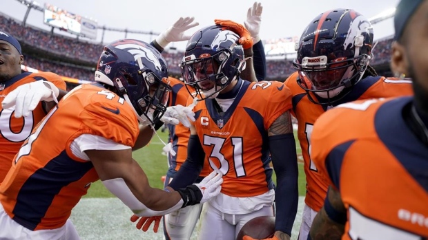 Which Denver Broncos safety will start opposite of Justin Simmons, Broncos  Camp Preview