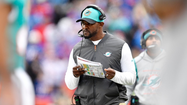 Flores fired after 3 playoff-less seasons with Dolphins