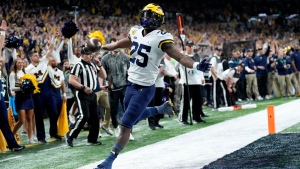 No. 2 Michigan takes Big Ten in rout, makes playoff pitch