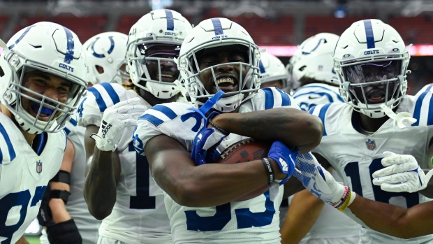 Taylor's two-TD day helps Colts rout woeful Texans 31-0