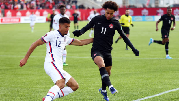 Tajon Buchanan (Canada) and Miles Robinson (USA)