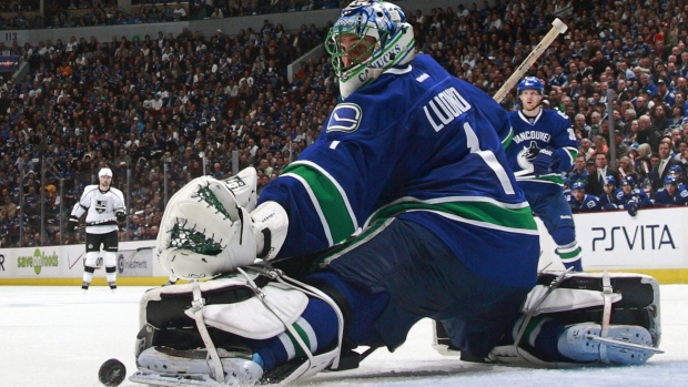 Vancouver Canuck Roberto Luongo shooting for Olympic gold