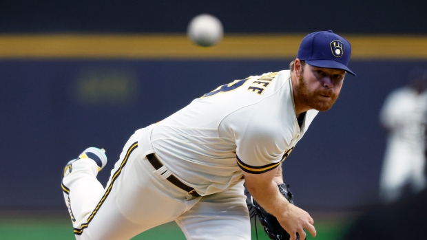 Brandon Woodruff pitches seven scoreless innings to lift Brewers