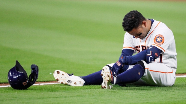 Fan wearing Jose Altuve jersey as fantasy football penalty hears