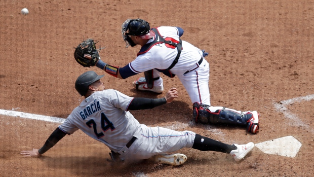 Garrett Cooper of the Miami Marlins in action against the