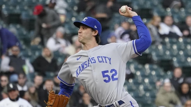 Singer pitches into sixth, Royals beat Rockies 2-0 to avoid sweep