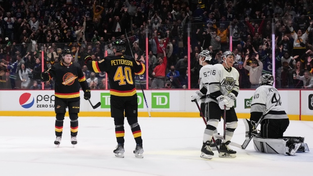 Brock Boeser and Elias Pettersson Celebrate