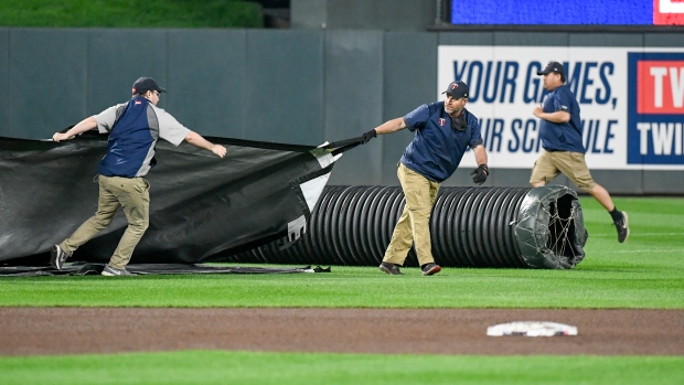 Minnesota Twins grounds crew rain Target Field