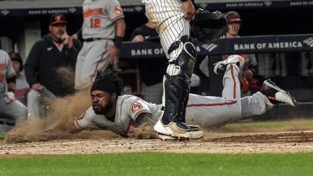 BALTIMORE, MD - APRIL 08: Baltimore Orioles third baseman Ramon Urias (29)  sprints down the first base line during the New York Yankees versus  Baltimore Orioles MLB game at Oriole Park at