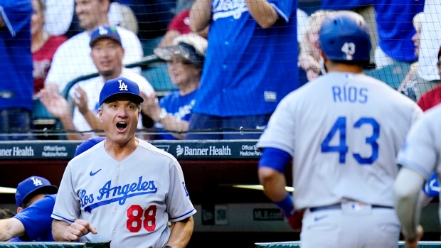 Los Angeles Dodgers Edwin Rios hits against the Arizona