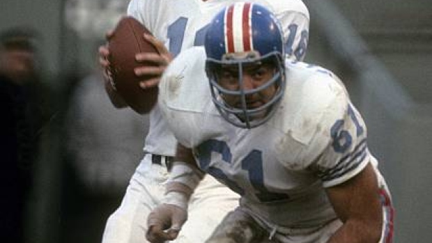 George Blanda, star quarterback for the Houston Oilers, gets some