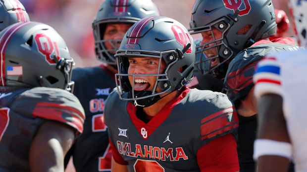 Oklahoma beats No. 19 Kansas 52-42 in Big 12 football game