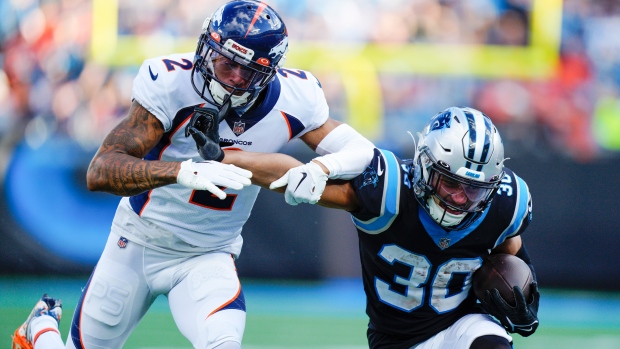 Carolina Panthers running back Chuba Hubbard (30) plays during an