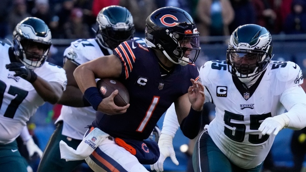 Fields breaks Douglass' QB rushing record in Bears' 25-20 loss to Eagles