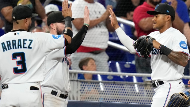 Gurriel scores to give Marlins a 10-9 victory over Cardinals