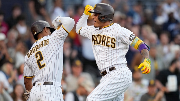 Machado homers, Padres win 5-3 while holding Ohtani hitless in