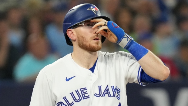 Blue Jays C Danny Jansen leaves game with left forearm contusion