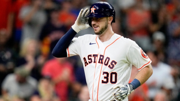 The baseball story behind the woman flashing a pitcher