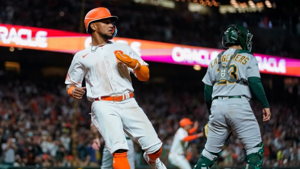 Mike Yastrzemski hits go-ahead double in the 8th, lifting Giants past A's  2-1 as fans unite in protest